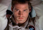 John Crichton with arm raised